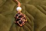 Stone pouch with light brown and Amethyst